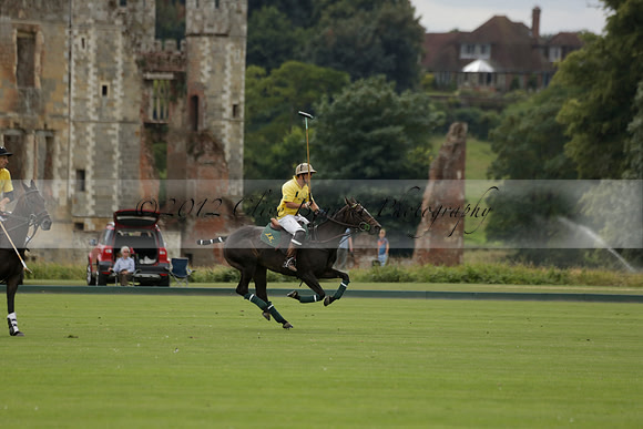 La Tremenda (lilac) v Maiz Dulce (yellow) in a Brecknock Cup polo match played on Lawns 1 at the Cowdray Park Polo Club on Tuesday 13 August 2013