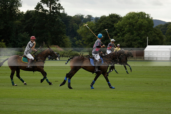 La Tremenda (lilac) v Maiz Dulce (yellow) in a Brecknock Cup polo match played on Lawns 1 at the Cowdray Park Polo Club on Tuesday 13 August 2013