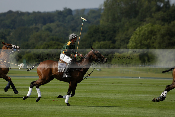 Maiz Dulce (green) v River (blue) in a Uber Polo Midsummer 12 goal polo match on Wednesday 21 August 2013 at Cowdray park Polo Club on Ambersham 2.  www.polopictures.co.uk
