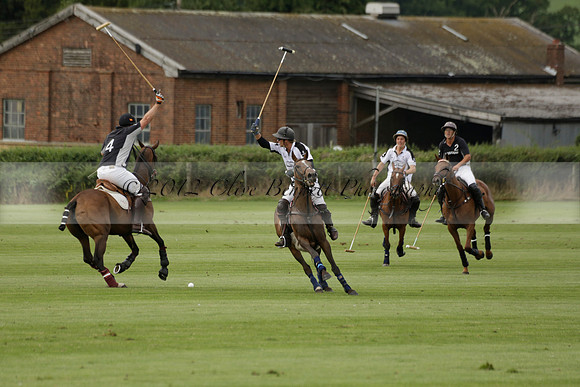 Beau Design v Boscom in an August Rother Cup 4 goal polo match at Cowdray Park Polo Club on Wednesday 07 August 2013