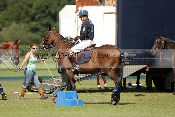 Maiz Dulce (green) v River (blue) in a Uber Polo Midsummer 12 goal polo match on Wednesday 21 August 2013 at Cowdray park Polo Club on Ambersham 2.  www.polopictures.co.uk