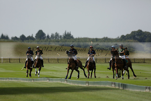 Maiz Dulce (green) v River (blue) in a Uber Polo Midsummer 12 goal polo match on Wednesday 21 August 2013 at Cowdray park Polo Club on Ambersham 2.  www.polopictures.co.uk