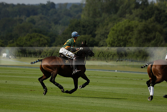 Maiz Dulce (green) v River (blue) in a Uber Polo Midsummer 12 goal polo match on Wednesday 21 August 2013 at Cowdray park Polo Club on Ambersham 2.  www.polopictures.co.uk