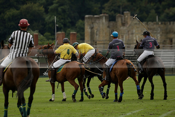 La Tremenda (lilac) v Maiz Dulce (yellow) in a Brecknock Cup polo match played on Lawns 1 at the Cowdray Park Polo Club on Tuesday 13 August 2013