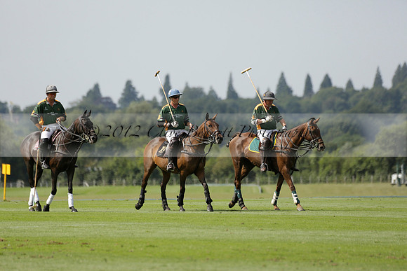 Maiz Dulce (green) v River (blue) in a Uber Polo Midsummer 12 goal polo match on Wednesday 21 August 2013 at Cowdray park Polo Club on Ambersham 2.  www.polopictures.co.uk
