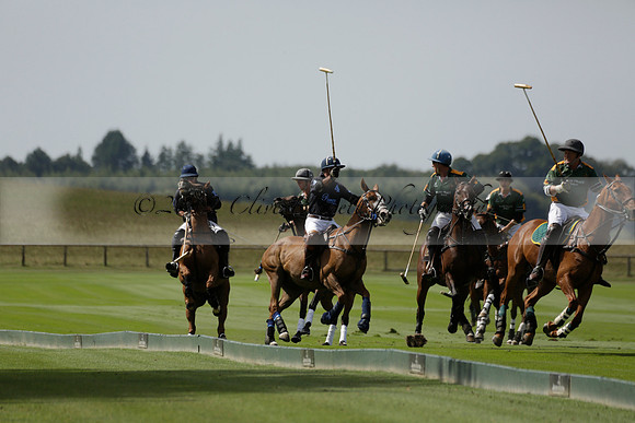 Maiz Dulce (green) v River (blue) in a Uber Polo Midsummer 12 goal polo match on Wednesday 21 August 2013 at Cowdray park Polo Club on Ambersham 2.  www.polopictures.co.uk