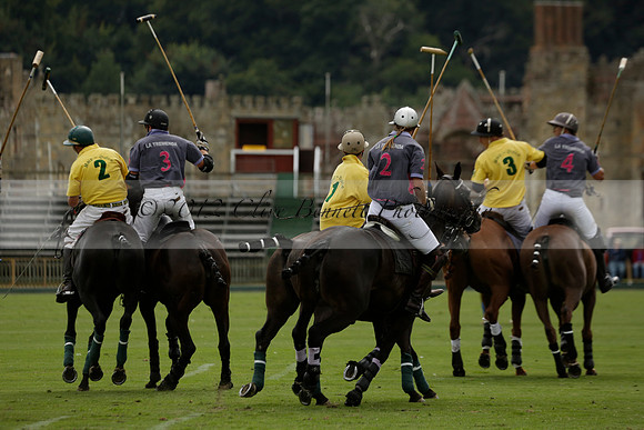 La Tremenda (lilac) v Maiz Dulce (yellow) in a Brecknock Cup polo match played on Lawns 1 at the Cowdray Park Polo Club on Tuesday 13 August 2013