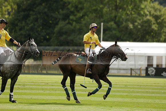 La Tremenda (lilac) v Maiz Dulce (yellow) in a Brecknock Cup polo match played on Lawns 1 at the Cowdray Park Polo Club on Tuesday 13 August 2013
