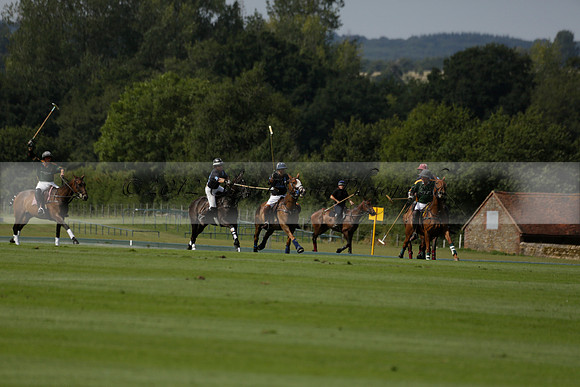 Maiz Dulce (green) v River (blue) in a Uber Polo Midsummer 12 goal polo match on Wednesday 21 August 2013 at Cowdray park Polo Club on Ambersham 2.  www.polopictures.co.uk