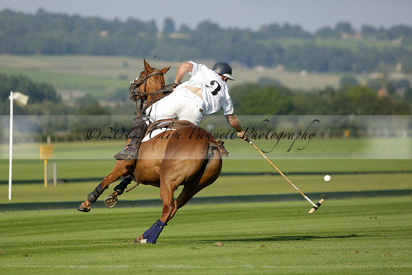 Pluma Negra (white) v Shoreline (black) in the Brecknock Cup Subsidiary final polo match played on Sunday 25 August 2013 at Cowdray Park Polo Club on Ambersham 1. 2013.10.12 www.polopictures.co.uk