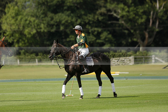 Maiz Dulce (green) v River (blue) in a Uber Polo Midsummer 12 goal polo match on Wednesday 21 August 2013 at Cowdray park Polo Club on Ambersham 2.  www.polopictures.co.uk