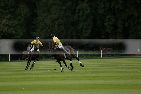 La Tremenda (lilac) v Maiz Dulce (yellow) in a Brecknock Cup polo match played on Lawns 1 at the Cowdray Park Polo Club on Tuesday 13 August 2013