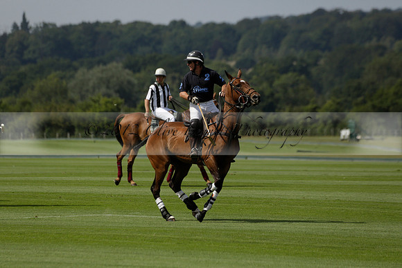 Maiz Dulce (green) v River (blue) in a Uber Polo Midsummer 12 goal polo match on Wednesday 21 August 2013 at Cowdray park Polo Club on Ambersham 2.  www.polopictures.co.uk