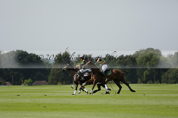 Maiz Dulce (green) v River (blue) in a Uber Polo Midsummer 12 goal polo match on Wednesday 21 August 2013 at Cowdray park Polo Club on Ambersham 2.  www.polopictures.co.uk
