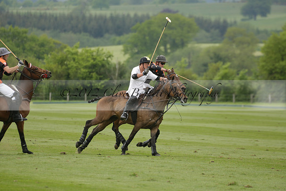 Poulton v Four Quarters Black in a Jaeger Le Coultre Dollar Cup Polo match 2013.05.22