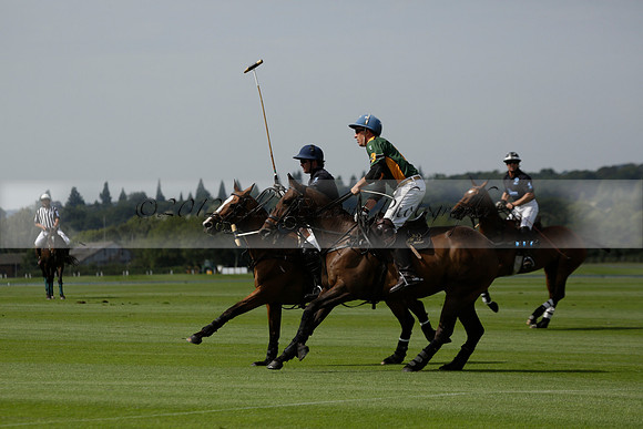 Maiz Dulce (green) v River (blue) in a Uber Polo Midsummer 12 goal polo match on Wednesday 21 August 2013 at Cowdray park Polo Club on Ambersham 2.  www.polopictures.co.uk