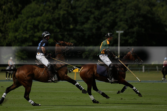 Maiz Dulce (green) v River (blue) in a Uber Polo Midsummer 12 goal polo match on Wednesday 21 August 2013 at Cowdray park Polo Club on Ambersham 2.  www.polopictures.co.uk