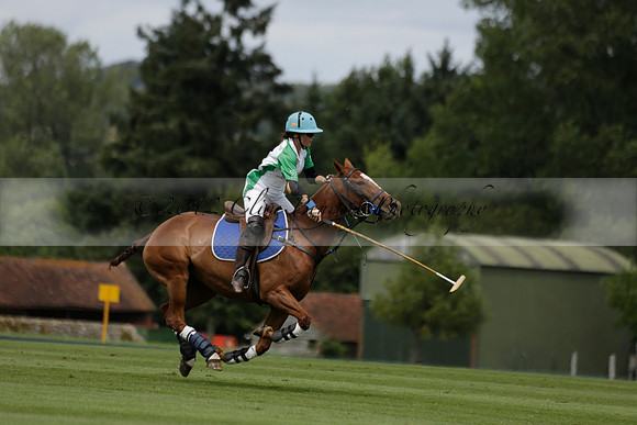 Burningfold (blue) v Wairakei Pastoral (green) in the Ruins Cup Final on Sunday 04 August 2013.