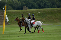Pluma Negra (white) v Shoreline (black) in the Brecknock Cup Subsidiary final polo match played on Sunday 25 August 2013 at Cowdray Park Polo Club on Ambersham 1. 2013.10.12 www.polopictures.co.uk
