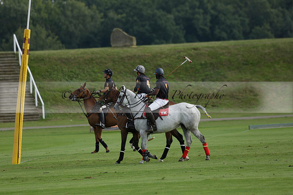 Pluma Negra (white) v Shoreline (black) in the Brecknock Cup Subsidiary final polo match played on Sunday 25 August 2013 at Cowdray Park Polo Club on Ambersham 1. 2013.10.12 www.polopictures.co.uk