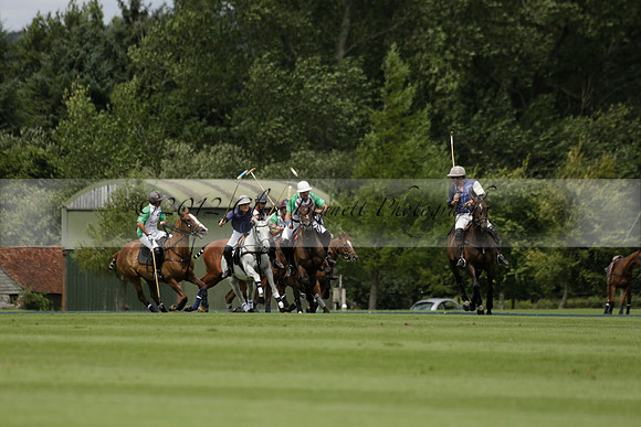 Burningfold (blue) v Wairakei Pastoral (green) in the Ruins Cup Final on Sunday 04 August 2013.