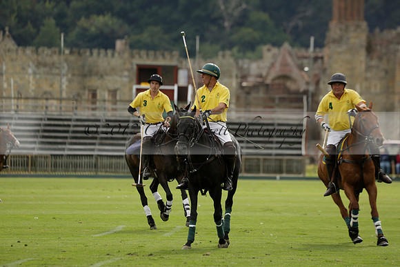 La Tremenda (lilac) v Maiz Dulce (yellow) in a Brecknock Cup polo match played on Lawns 1 at the Cowdray Park Polo Club on Tuesday 13 August 2013