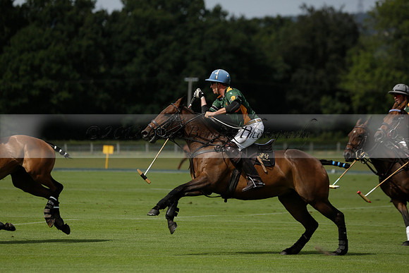 Maiz Dulce (green) v River (blue) in a Uber Polo Midsummer 12 goal polo match on Wednesday 21 August 2013 at Cowdray park Polo Club on Ambersham 2.  www.polopictures.co.uk