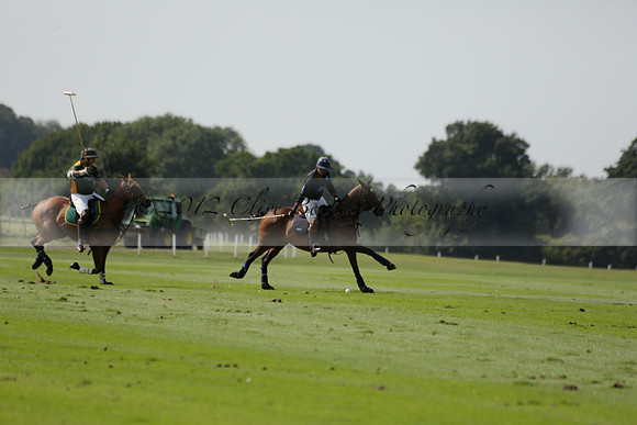Maiz Dulce (green) v River (blue) in a Uber Polo Midsummer 12 goal polo match on Wednesday 21 August 2013 at Cowdray park Polo Club on Ambersham 2.  www.polopictures.co.uk