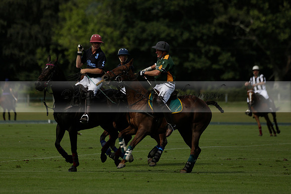 Maiz Dulce (green) v River (blue) in a Uber Polo Midsummer 12 goal polo match on Wednesday 21 August 2013 at Cowdray park Polo Club on Ambersham 2.  www.polopictures.co.uk
