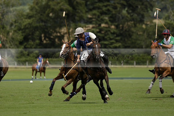 Burningfold (blue) v Wairakei Pastoral (green) in the Ruins Cup Final on Sunday 04 August 2013.