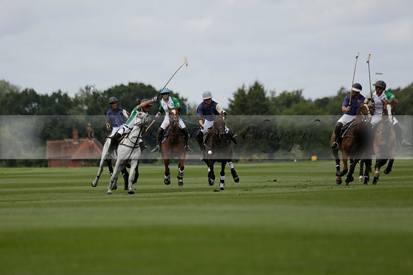 Burningfold (blue) v Wairakei Pastoral (green) in the Ruins Cup Final on Sunday 04 August 2013.