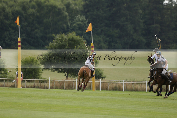 Beau Design v Boscom in an August Rother Cup 4 goal polo match at Cowdray Park Polo Club on Wednesday 07 August 2013