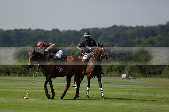 Maiz Dulce (green) v River (blue) in a Uber Polo Midsummer 12 goal polo match on Wednesday 21 August 2013 at Cowdray park Polo Club on Ambersham 2.  www.polopictures.co.uk
