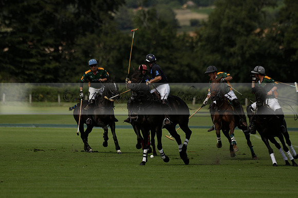 Maiz Dulce (green) v River (blue) in a Uber Polo Midsummer 12 goal polo match on Wednesday 21 August 2013 at Cowdray park Polo Club on Ambersham 2.  www.polopictures.co.uk