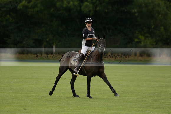 Beau Design v Boscom in an August Rother Cup 4 goal polo match at Cowdray Park Polo Club on Wednesday 07 August 2013
