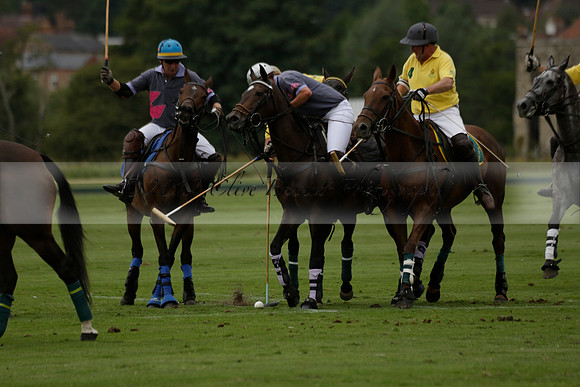 La Tremenda (lilac) v Maiz Dulce (yellow) in a Brecknock Cup polo match played on Lawns 1 at the Cowdray Park Polo Club on Tuesday 13 August 2013