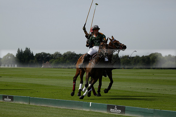 Maiz Dulce (green) v River (blue) in a Uber Polo Midsummer 12 goal polo match on Wednesday 21 August 2013 at Cowdray park Polo Club on Ambersham 2.  www.polopictures.co.uk