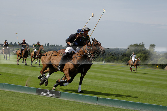 Maiz Dulce (green) v River (blue) in a Uber Polo Midsummer 12 goal polo match on Wednesday 21 August 2013 at Cowdray park Polo Club on Ambersham 2.  www.polopictures.co.uk