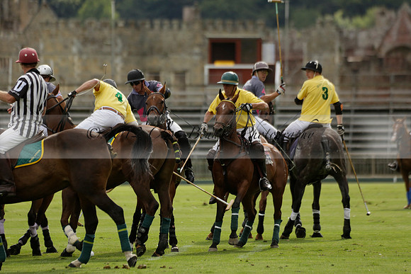 La Tremenda (lilac) v Maiz Dulce (yellow) in a Brecknock Cup polo match played on Lawns 1 at the Cowdray Park Polo Club on Tuesday 13 August 2013
