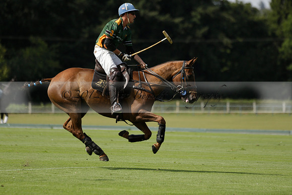 Maiz Dulce (green) v River (blue) in a Uber Polo Midsummer 12 goal polo match on Wednesday 21 August 2013 at Cowdray park Polo Club on Ambersham 2.  www.polopictures.co.uk