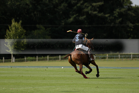 Maiz Dulce (green) v River (blue) in a Uber Polo Midsummer 12 goal polo match on Wednesday 21 August 2013 at Cowdray park Polo Club on Ambersham 2.  www.polopictures.co.uk