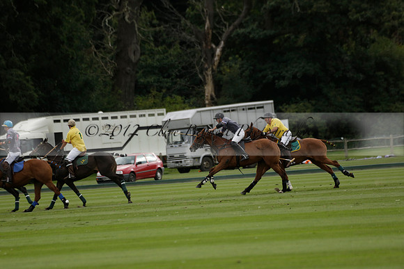 La Tremenda (lilac) v Maiz Dulce (yellow) in a Brecknock Cup polo match played on Lawns 1 at the Cowdray Park Polo Club on Tuesday 13 August 2013