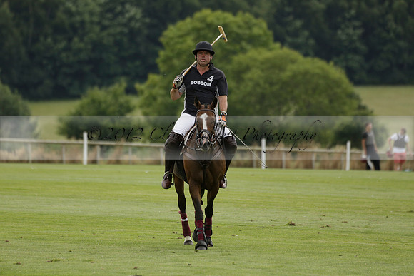 Beau Design v Boscom in an August Rother Cup 4 goal polo match at Cowdray Park Polo Club on Wednesday 07 August 2013
