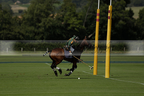 Maiz Dulce (green) v River (blue) in a Uber Polo Midsummer 12 goal polo match on Wednesday 21 August 2013 at Cowdray park Polo Club on Ambersham 2.  www.polopictures.co.uk