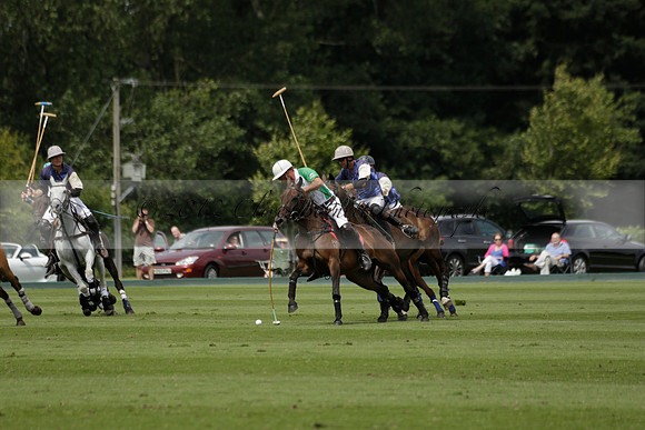 Burningfold (blue) v Wairakei Pastoral (green) in the Ruins Cup Final on Sunday 04 August 2013.