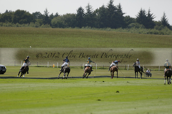 Maiz Dulce (green) v River (blue) in a Uber Polo Midsummer 12 goal polo match on Wednesday 21 August 2013 at Cowdray park Polo Club on Ambersham 2.  www.polopictures.co.uk
