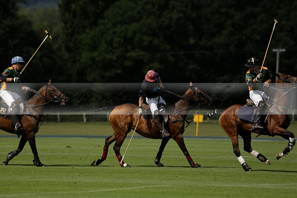 Maiz Dulce (green) v River (blue) in a Uber Polo Midsummer 12 goal polo match on Wednesday 21 August 2013 at Cowdray park Polo Club on Ambersham 2.  www.polopictures.co.uk
