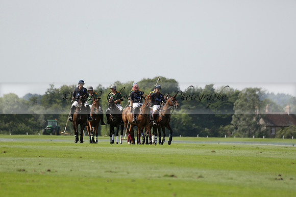 Maiz Dulce (green) v River (blue) in a Uber Polo Midsummer 12 goal polo match on Wednesday 21 August 2013 at Cowdray park Polo Club on Ambersham 2.  www.polopictures.co.uk