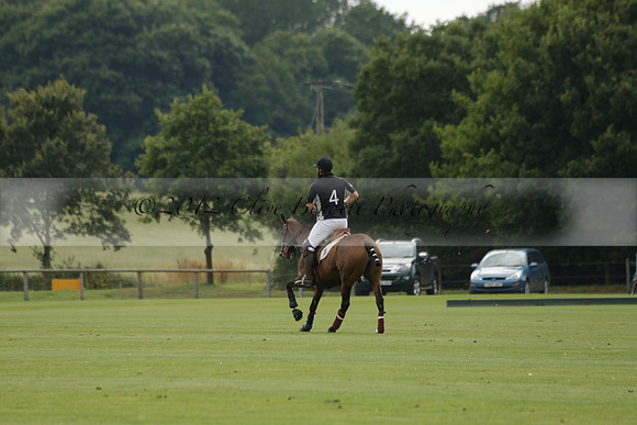 Beau Design v Boscom in an August Rother Cup 4 goal polo match at Cowdray Park Polo Club on Wednesday 07 August 2013