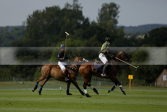 Maiz Dulce (green) v River (blue) in a Uber Polo Midsummer 12 goal polo match on Wednesday 21 August 2013 at Cowdray park Polo Club on Ambersham 2.  www.polopictures.co.uk